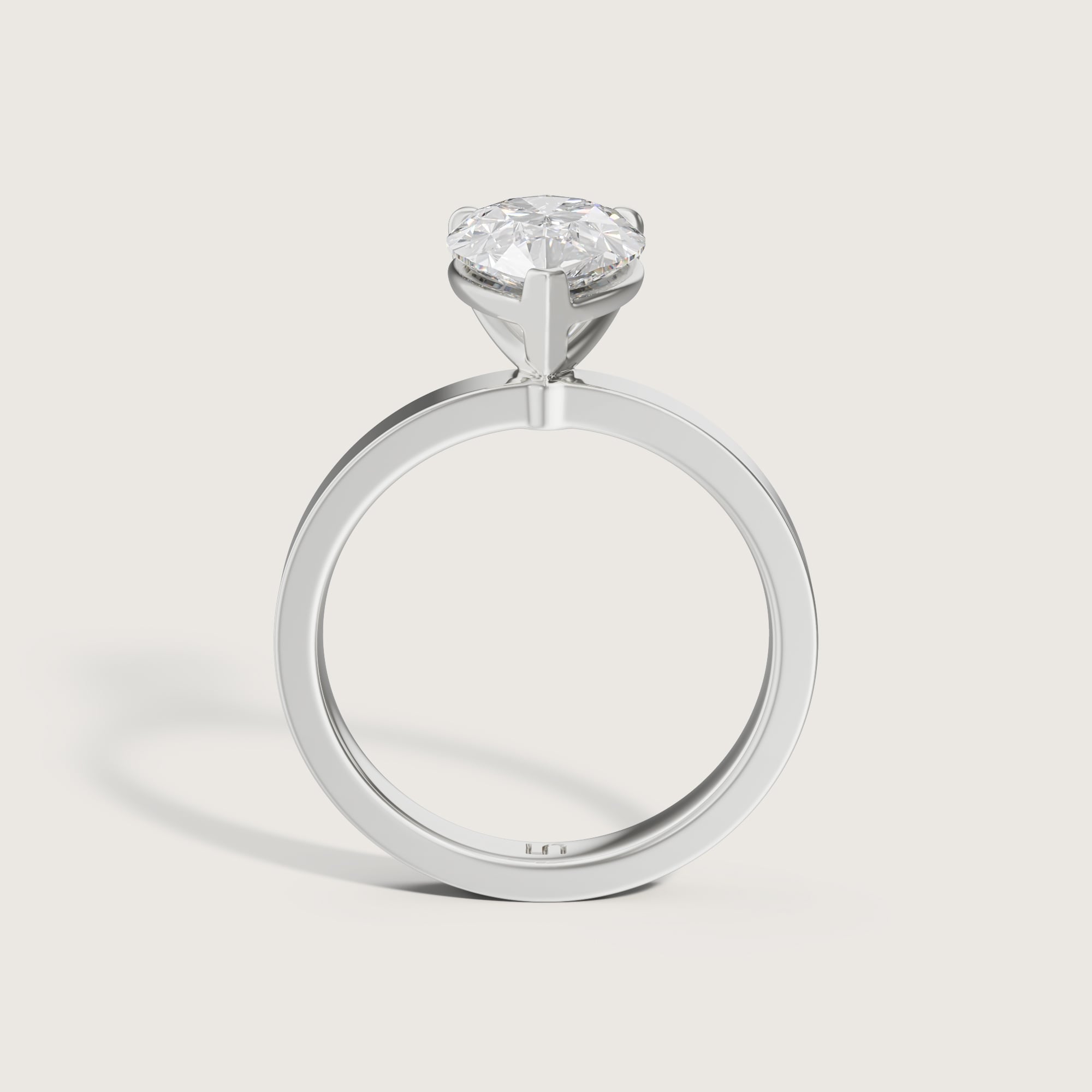 Diamond solitaire ring — on stand