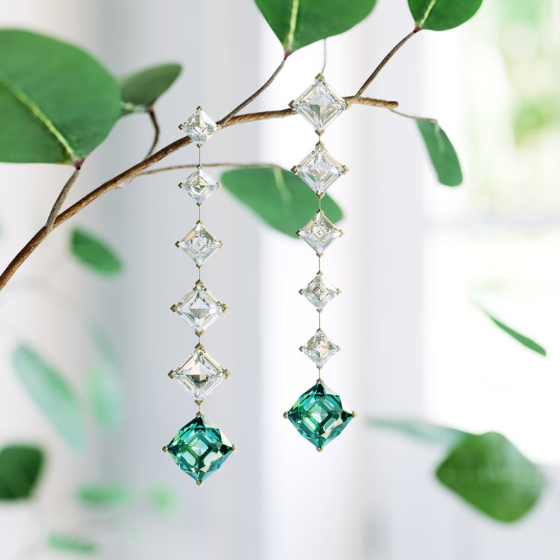 Diamond pendant and earrings — advertising render