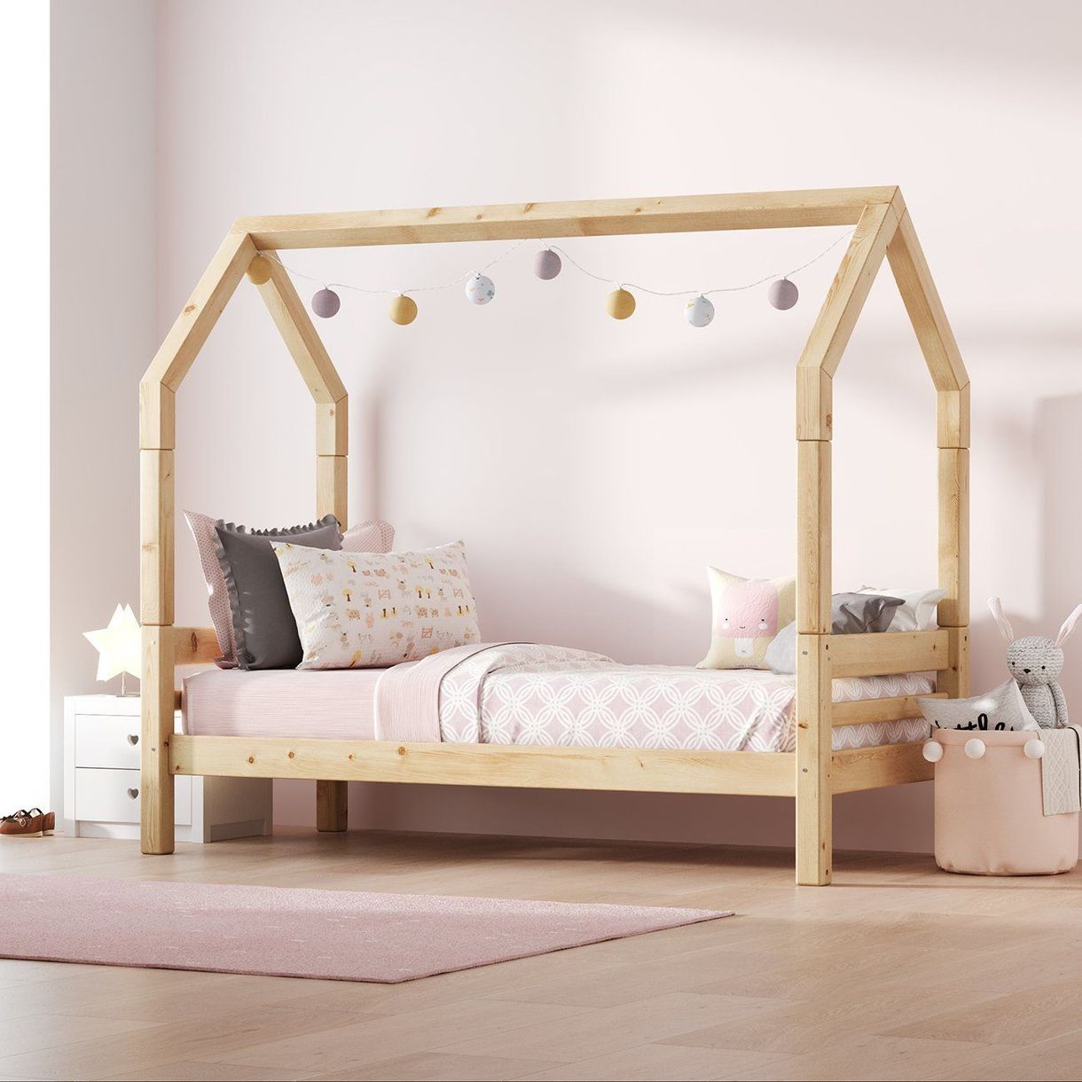 Photorealistic 3D rendering of a wooden children's bed with decorative pillows and toys, showcasing 3D product modeling and visualization.