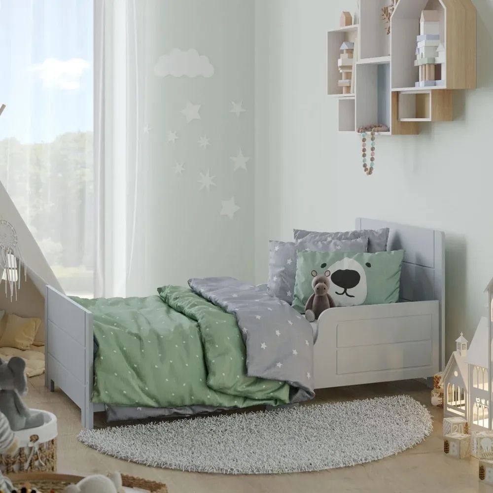 3D visualization of a cozy kids room with gray bed, green bedding, and wall decorations