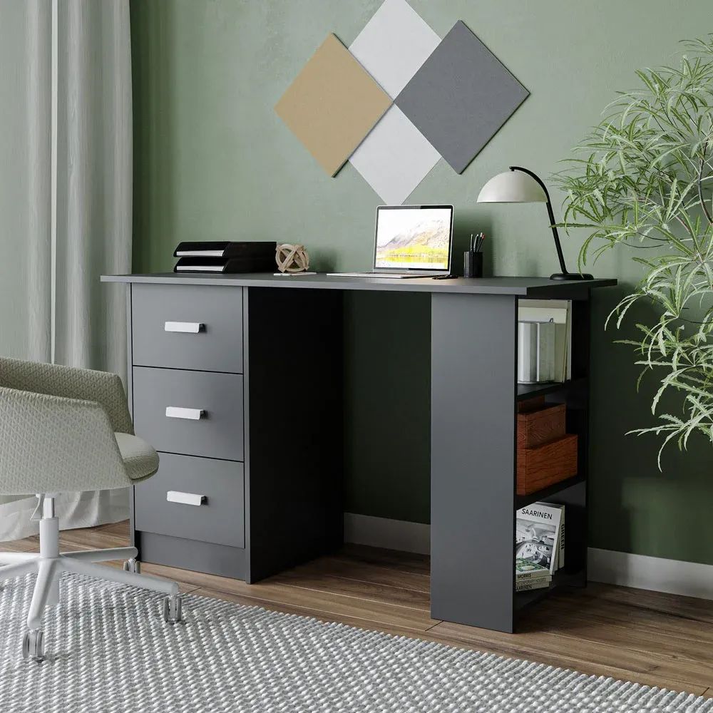 3D visualization of a modern black desk with drawers, shelves, laptop, and lamp against green wall