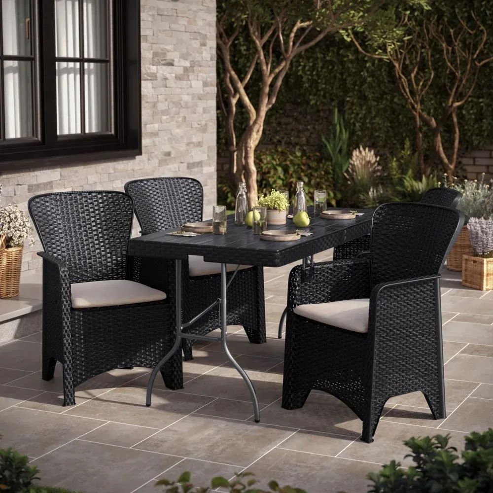 3D visualization of outdoor dining set with four wicker chairs and square table arranged on stone patio