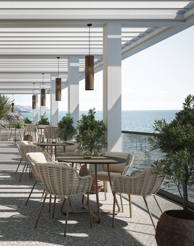 Top-notch 3D furniture visualization of an outdoor patio with wicker chairs and ocean view, showcasing photorealistic rendering and 3D modeling techniques.