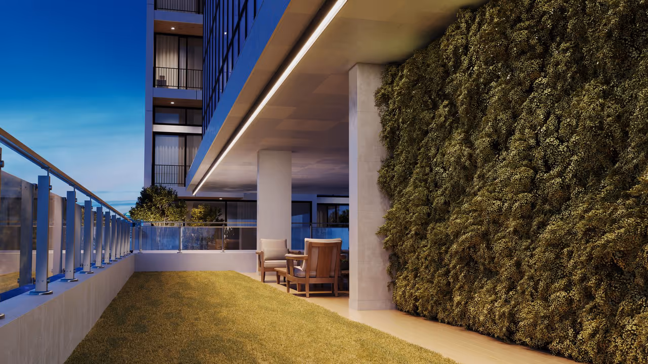 A terrace with a long ceiling strip above greenery shown in a lifestyle product rendering