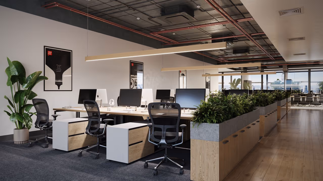 An open office with suspended linear fixtures and green dividers shown in a lifestyle product rendering