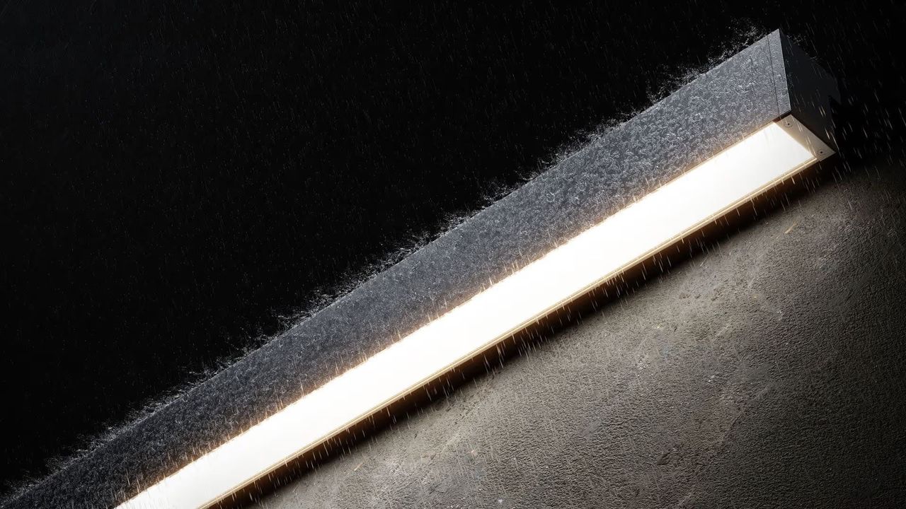 Close up of a weather resistant linear outdoor light fixture with water droplets on the surface in product rendering