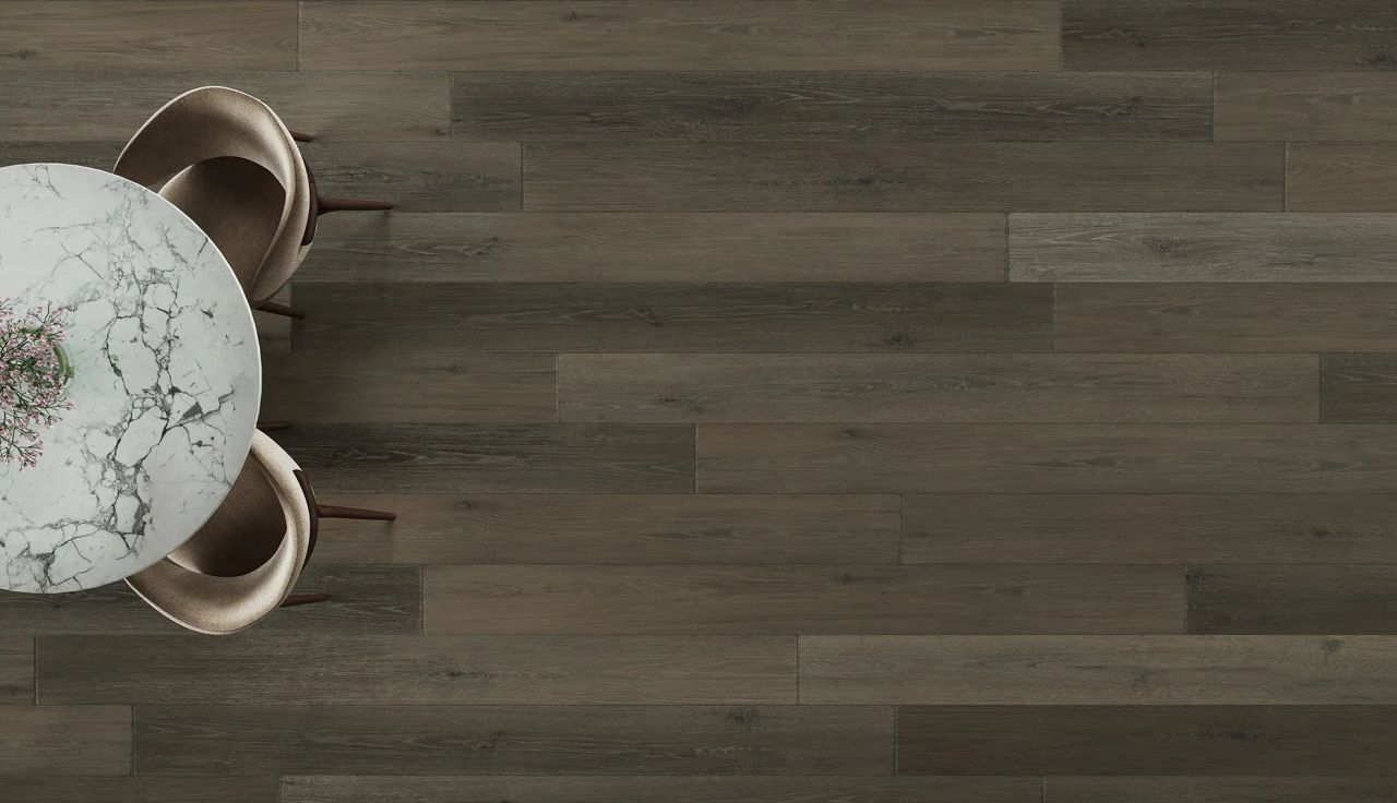 3D visualization of dark brown wooden flooring with marble dining table and chairs in top view