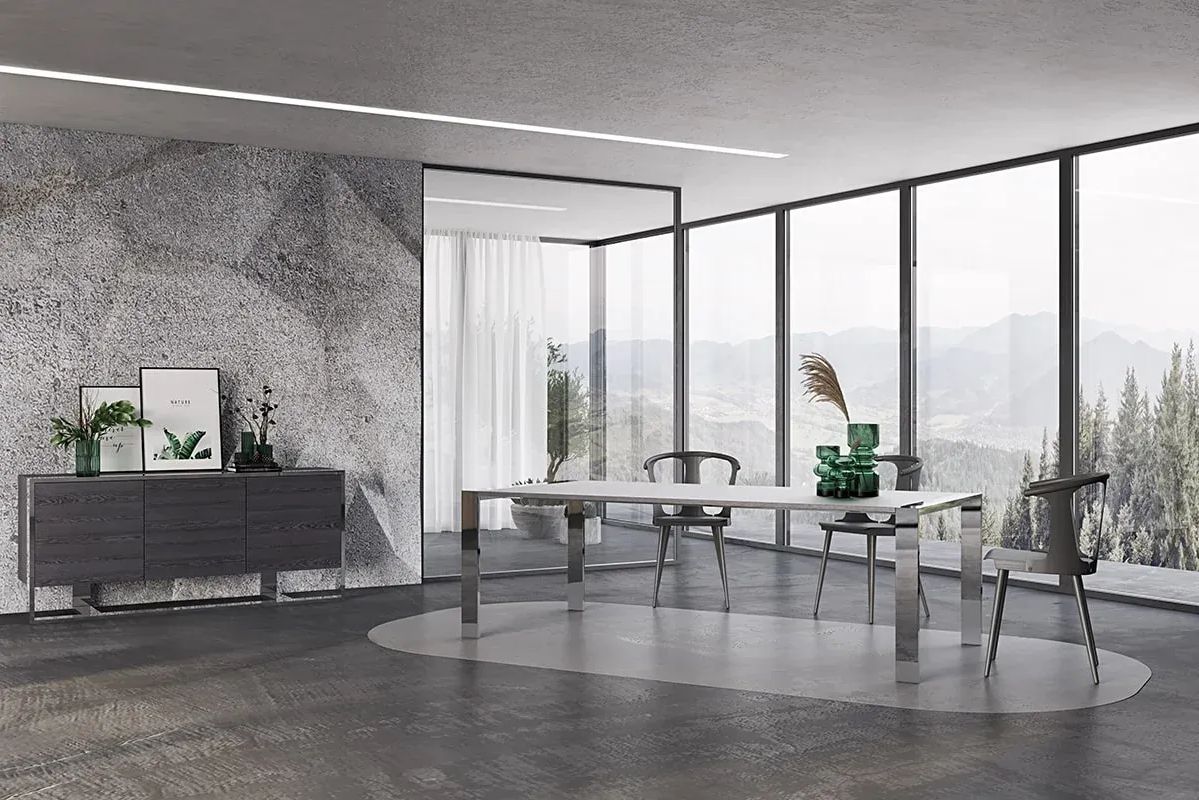 3D visualization of a room with a sleek glass-top table, gray chairs, and a panoramic mountain view