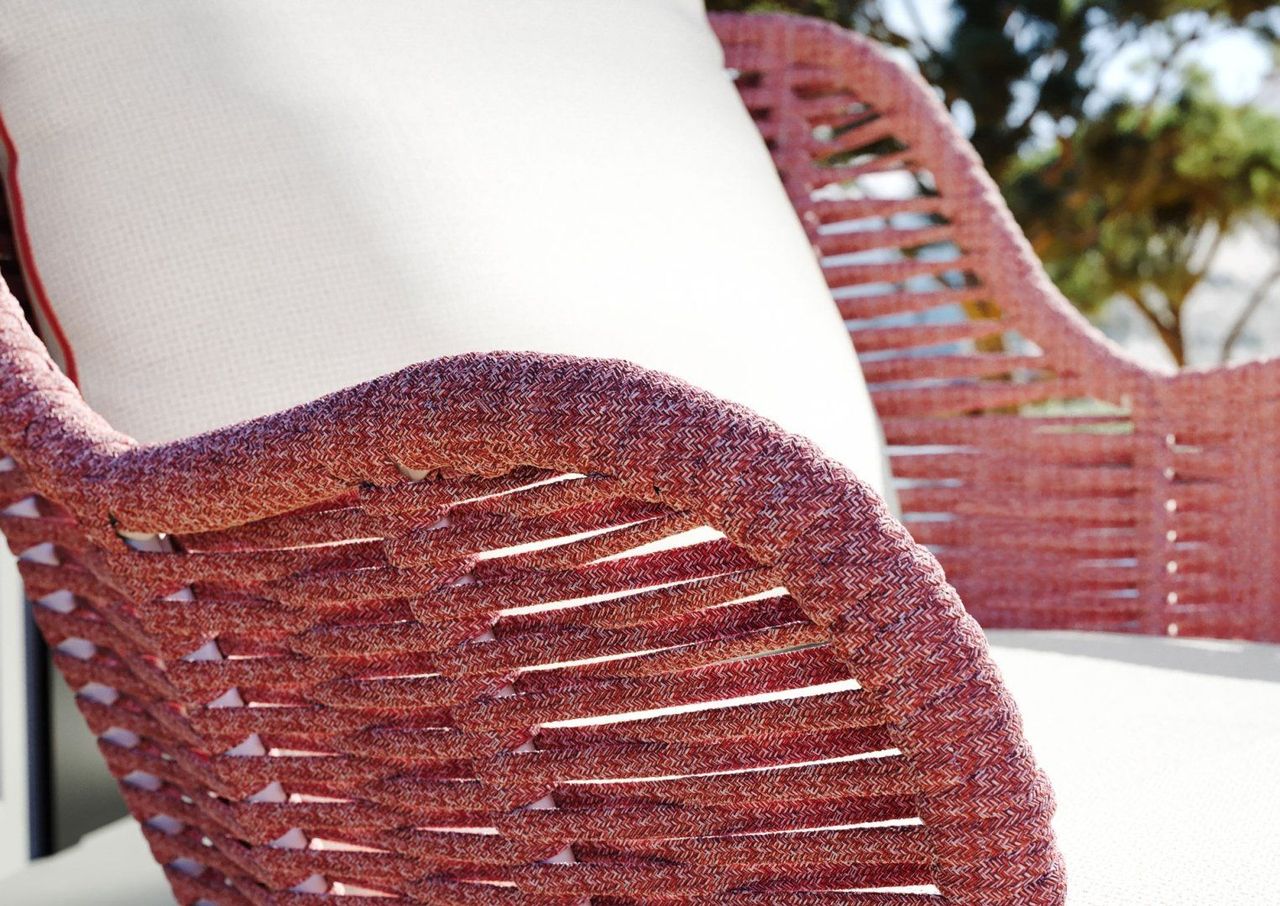 3D rendered image of a woven chair showcasing realistic house fittings rendering and 3D product visualization