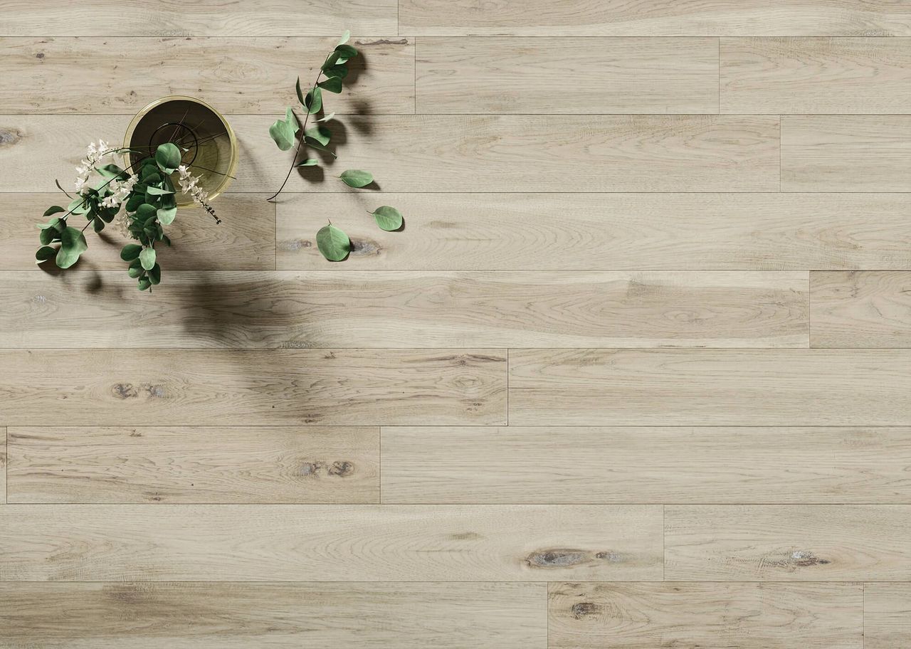 3D visualization of light oak wooden flooring with vase and green leaves decor in top view