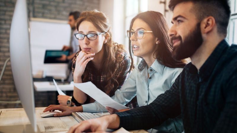 A Product Design Team Enjoying the Benefits of 3D Modeling and Rendering While Approving the Design