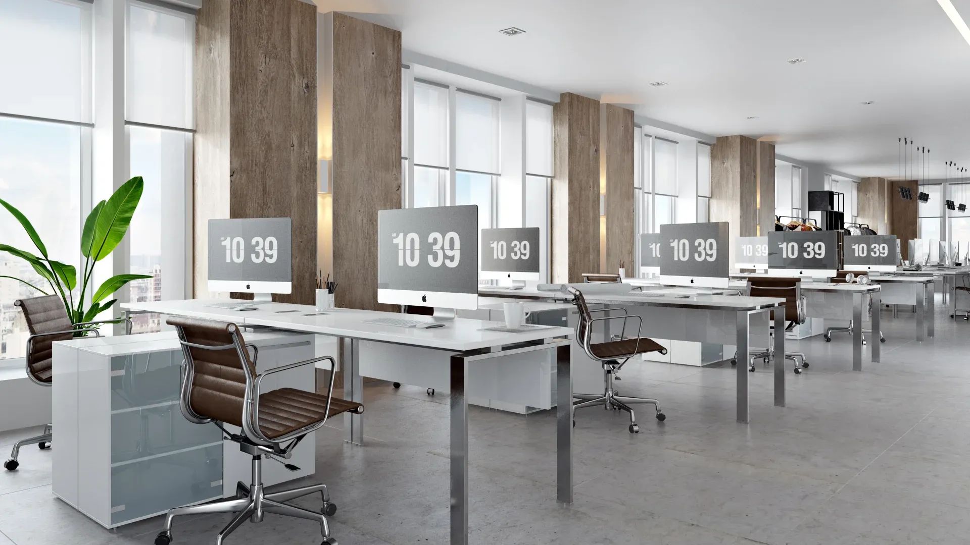 Interior of a 3D rendering studio with desktops and computers