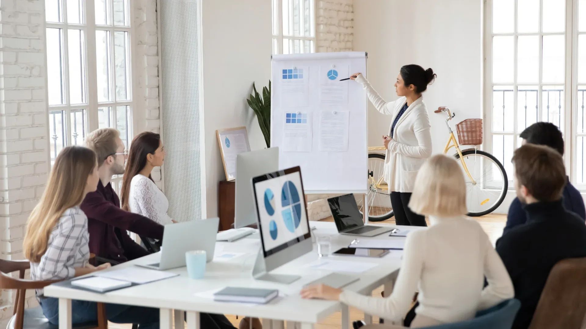 A Group of Marketers Working on Product Presentation With Effective Assets