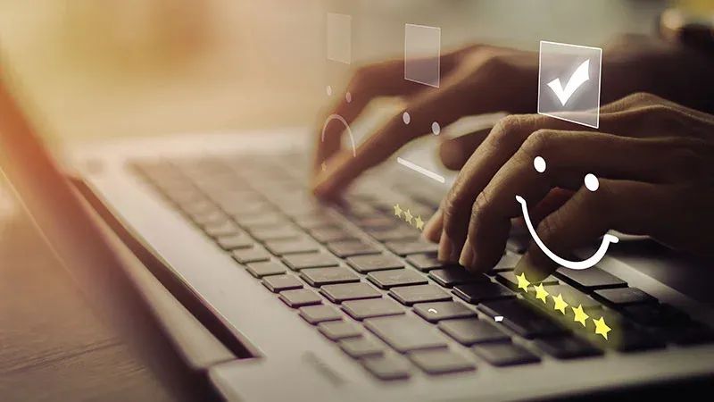 Marketer checking the results of a furniture model test on a laptop