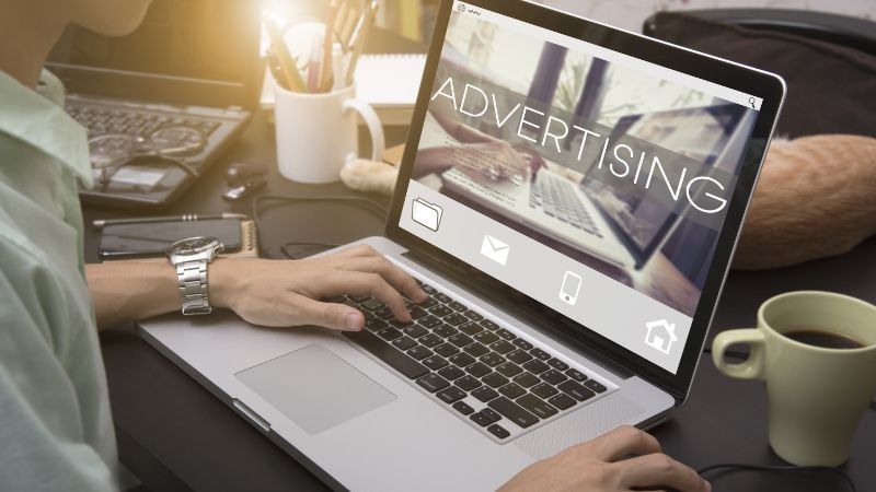 A Marketer Promoting a New Product to Customers Using Digital Advertising