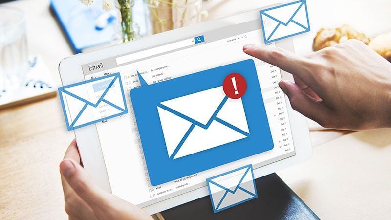 A Person Using Post-Purchase Email Marketing to Maintain Their Customers