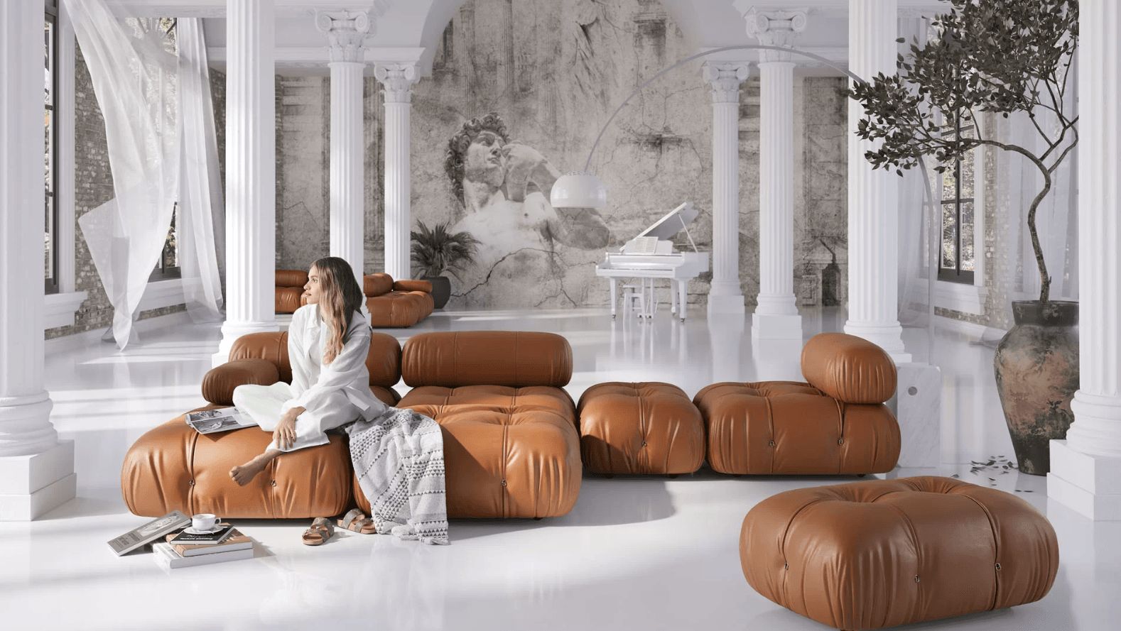 3D-rendered interior of a bright room with Roman columns, white walls, and a modular brown sofa with a woman sitting on it.