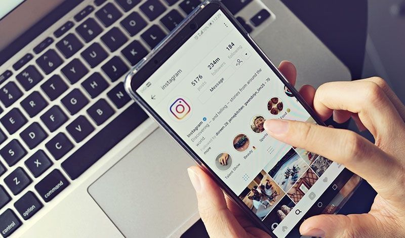 A Person Setting Up a Type of Product Advert for Social Media