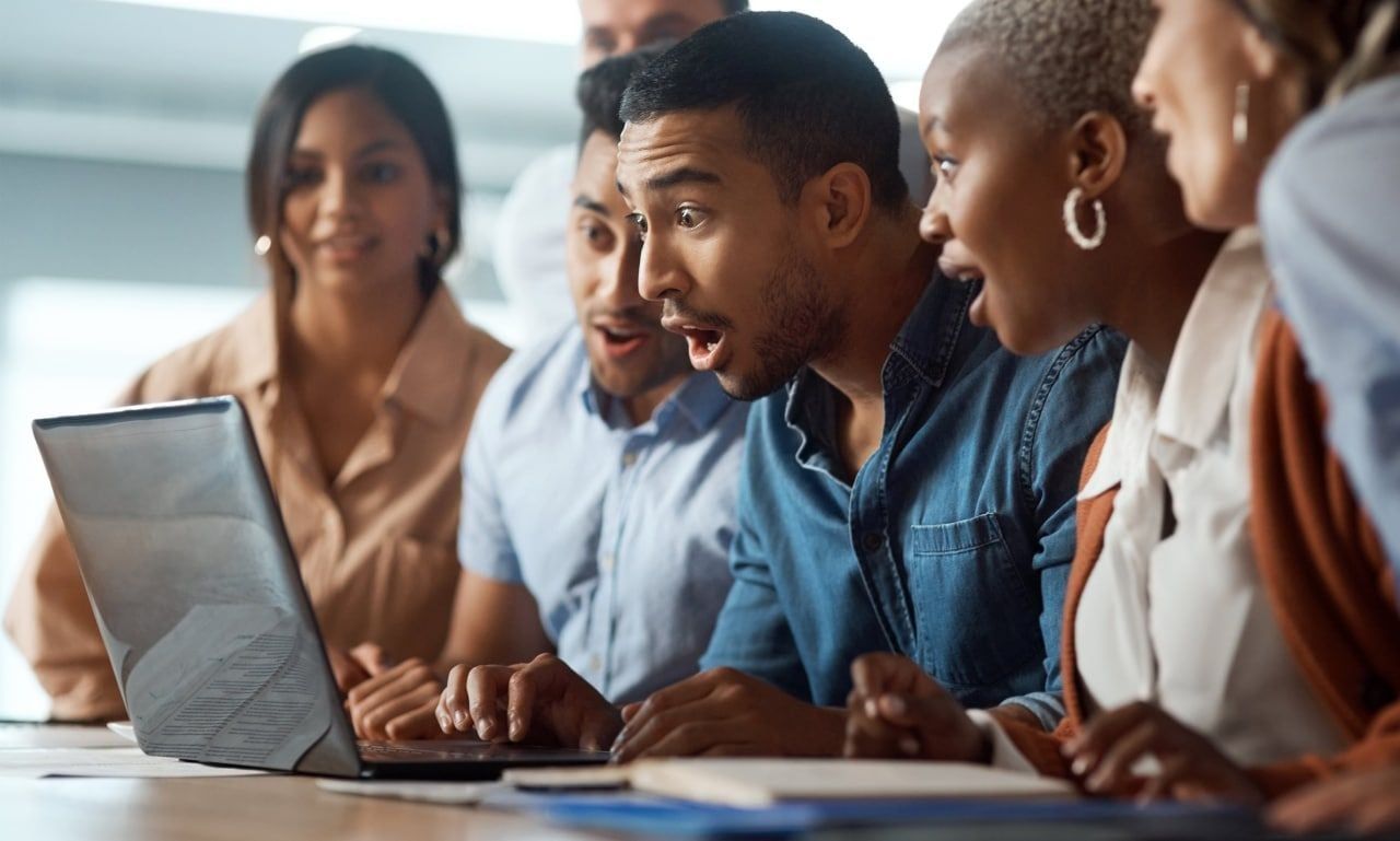 Team discussing PDCA vs DMAIC methodologies