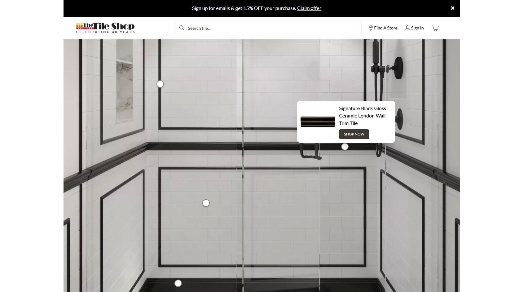 Tiles 3D rendering of a shower wall with black trim framing glossy white ceramic tiles published on the Tile Shop website