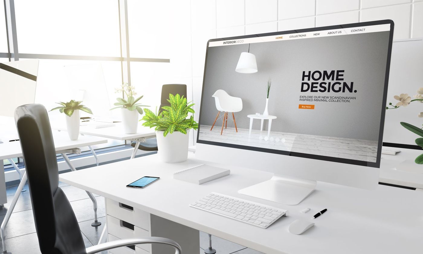 Computer with a furniture website shown on the screen