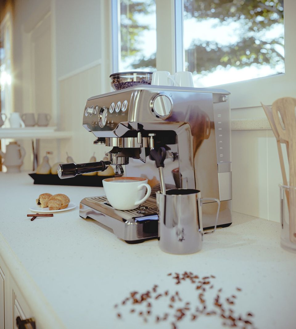 Photorealistic 3D rendering of a coffee machine on a kitchen counter, showcasing high-end 3D product visualization and interior rendering.