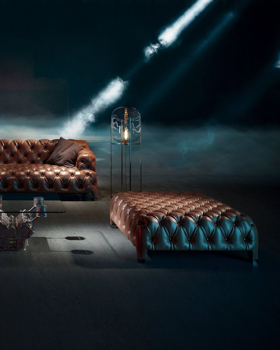 Product Rendering of a Leather Sofa Set with Glass Lamp and Dramatic Background