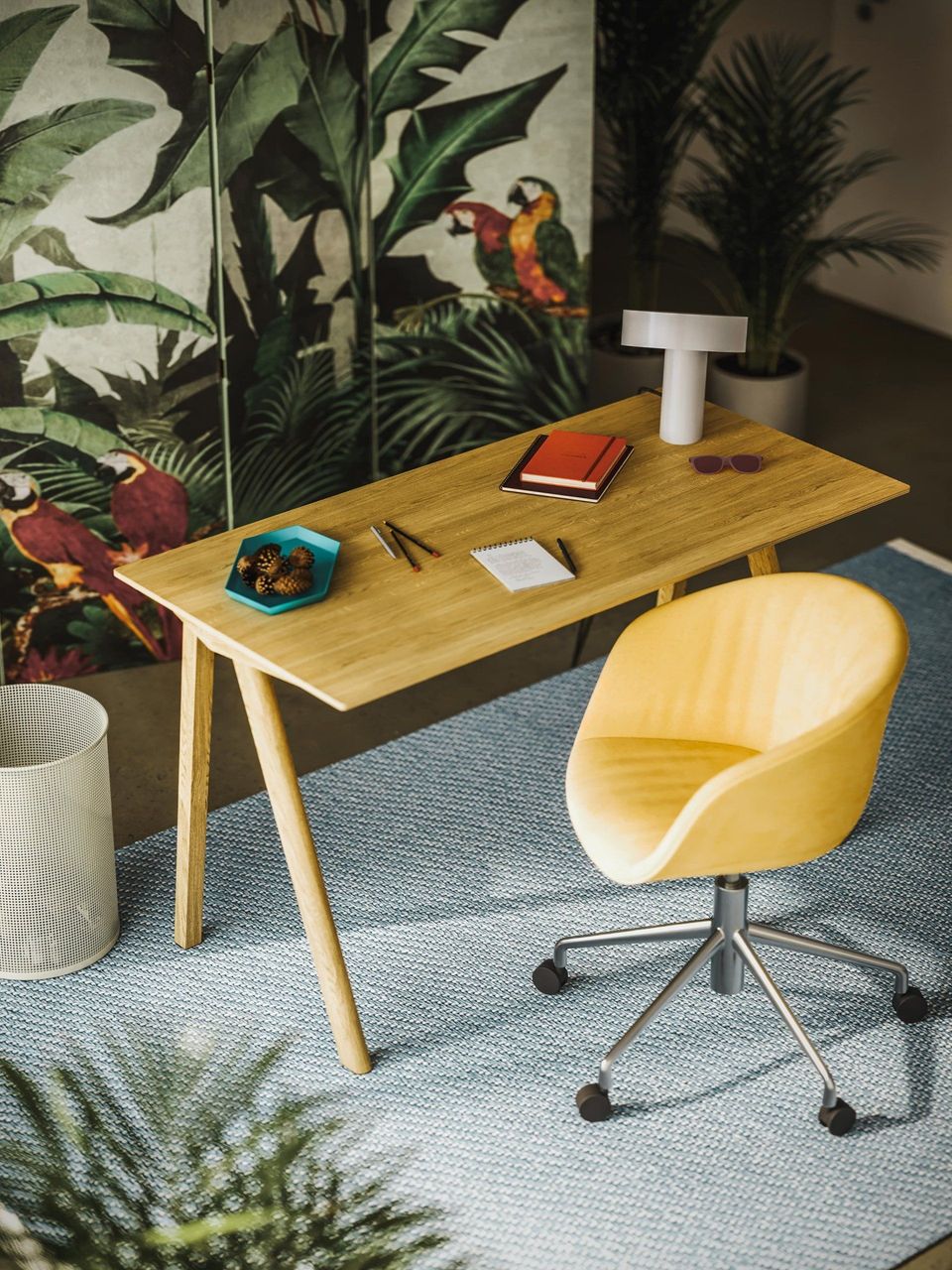 3D rendered image of a trendy workspace with wooden desk and yellow chair, showcasing 3D house fittings modeling and interior visualization