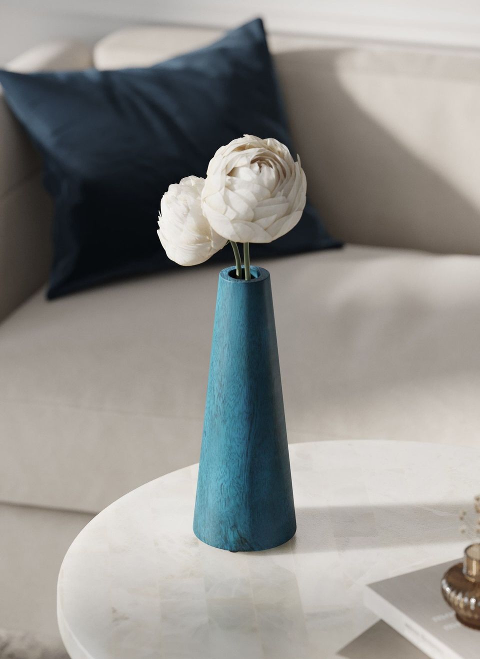 3D rendered image of a trendy vase on a table, showcasing 3D furniture modeling and photorealistic rendering in a lifestyle setting