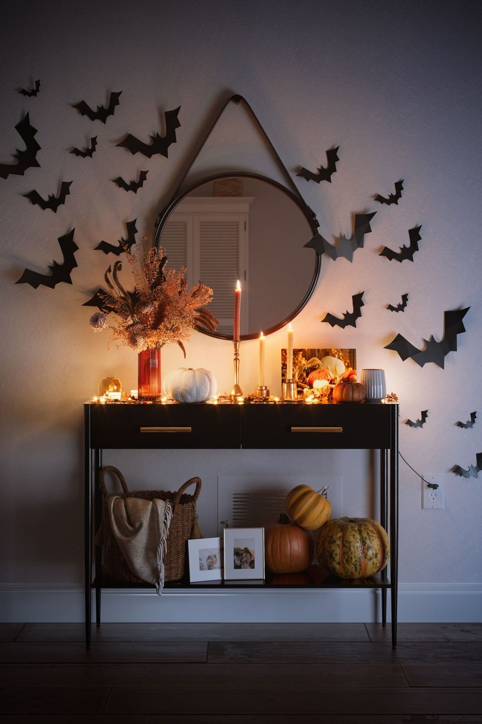 3D lifestyle visualization showcasing Halloween-themed interior with realistic furniture rendering, featuring pumpkins and decorative bats.