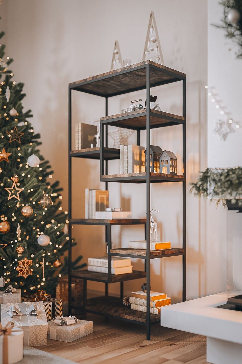3D furniture modeling and rendering showcasing a festive interior with a decorated Christmas tree and a modern shelf unit.