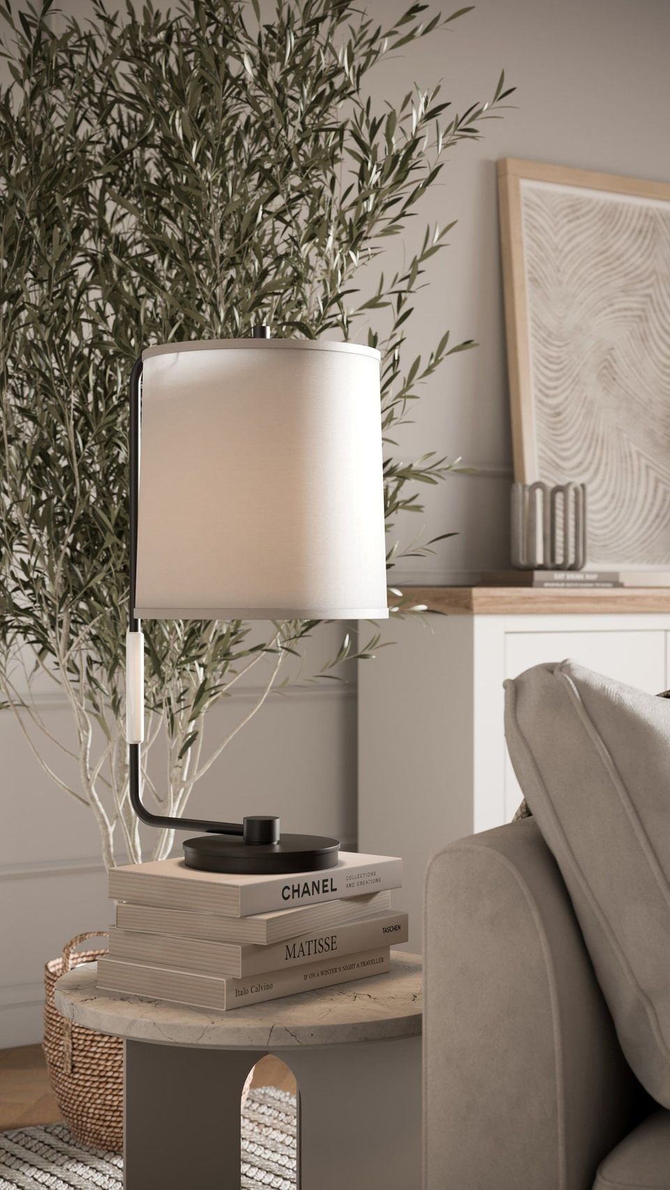 3D rendered image showcasing a trendy living room scene with a stylish lamp on a stack of books, demonstrating 3D house fittings modeling and rendering techniques.
