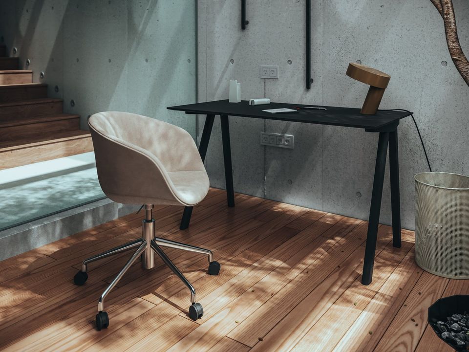 Lifestyle Rendering of a Minimalist Home Office with Rolling Chair, and Desk,