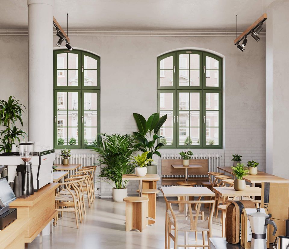 Realistic 3D rendering of a trendy cafe interior showcasing realistic house fittings and plants, highlighting 3D house fittings modeling and visualization.
