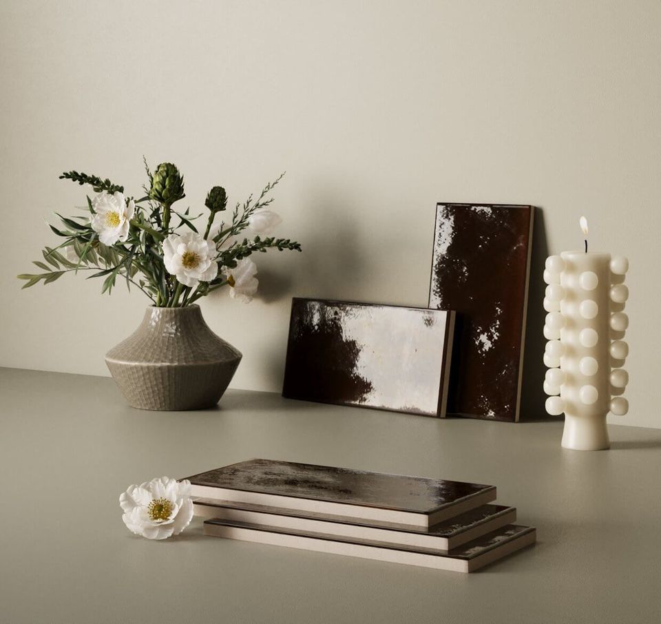3D furniture rendering showcasing a vase with flowers, decorative tiles, and a candle, highlighting photorealistic 3D interior visualization and rendering techniques.
