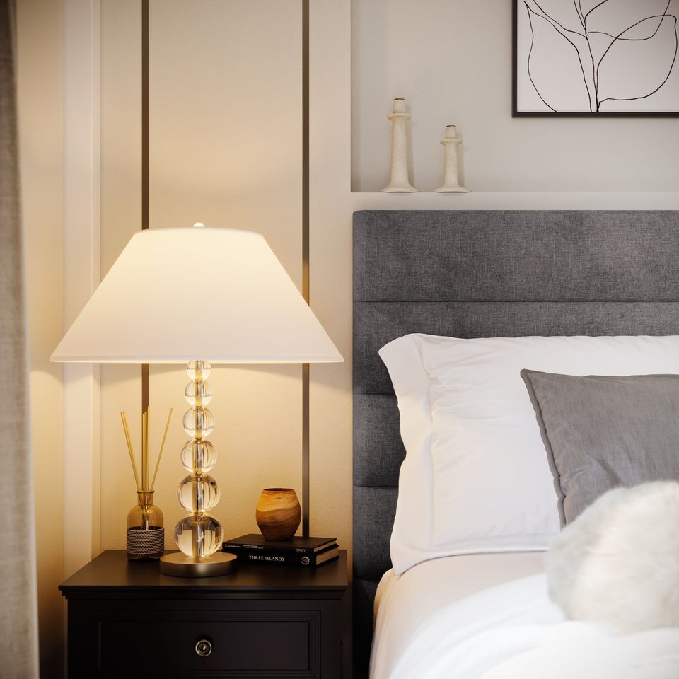 High-quality 3D rendering of a bedroom scene featuring a lamp on a nightstand, showcasing realistic furniture rendering and 3D interior visualization.