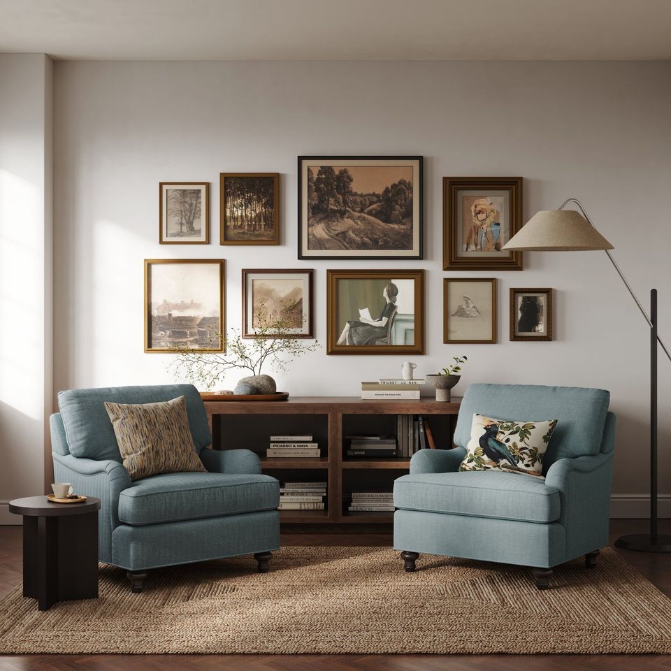 3D product rendering showcasing a cozy living room with armchairs, wall art, and decor, highlighting 3D interior visualization and realistic product rendering.