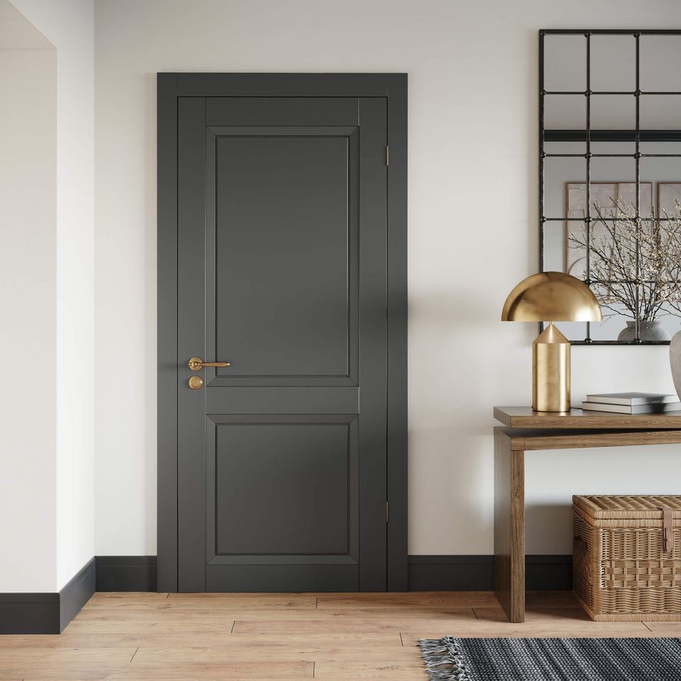 Photorealistic 3D rendering of a modern interior with a dark door, wooden table, and decorative items, showcasing 3D furniture modeling and visualization.