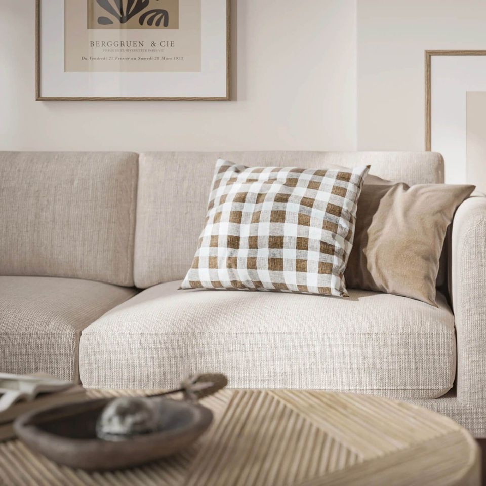 High-quality 3D furniture rendering showcasing a modern sofa with cushions, demonstrating photorealistic 3D interior visualization and CGI rendering.