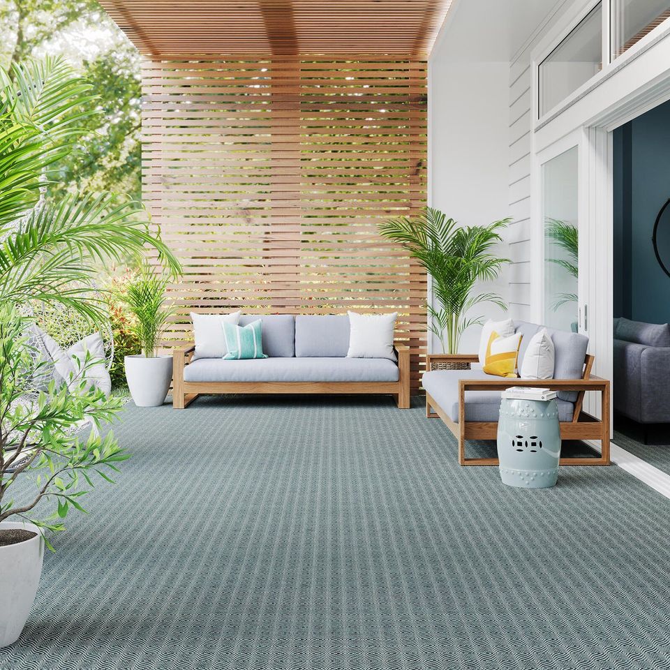 High-quality 3D furniture rendering showcasing a modern patio with realistic furniture and plants, demonstrating 3D modeling and visualization techniques.