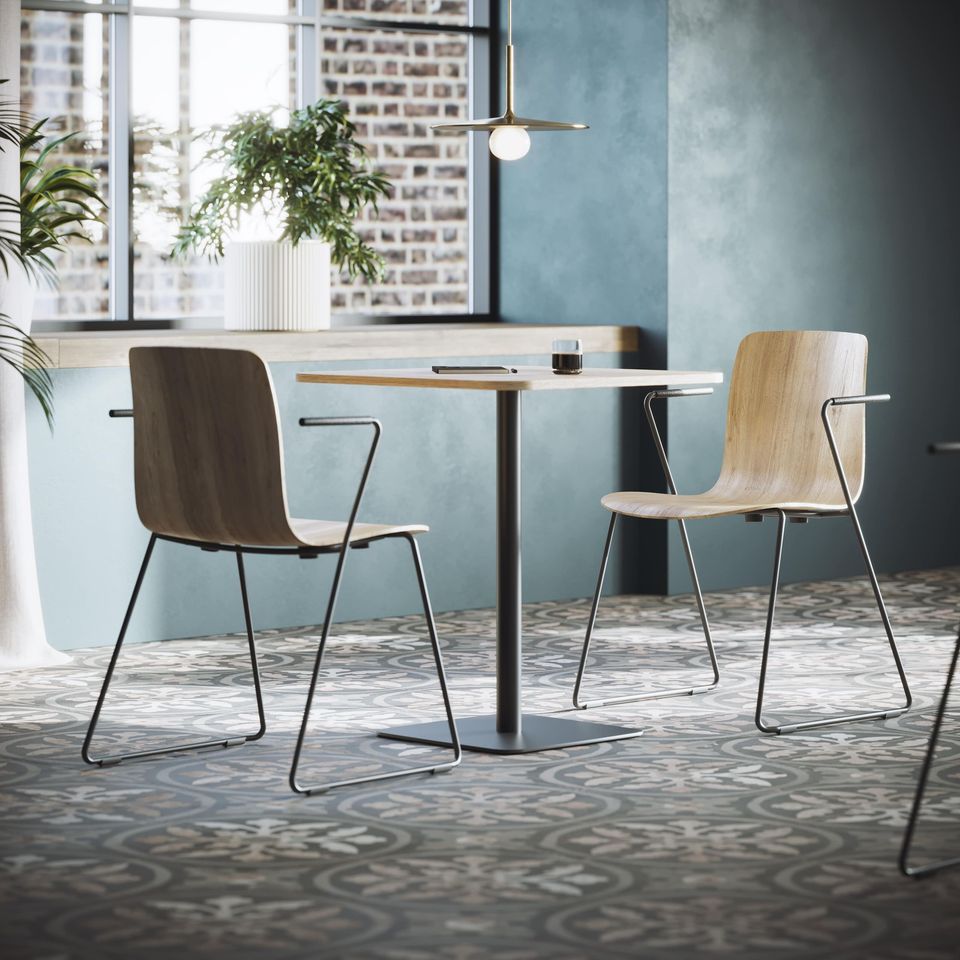 3D Visualization of a Dining Nook with Wooden Chairs, Pendant Lamp, and Blue Accent Wall