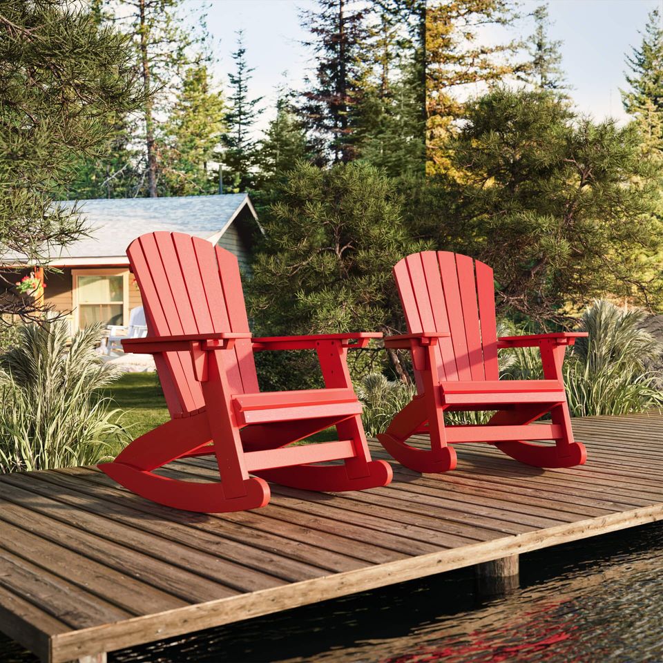 3D rendered image of red Adirondack chairs on a wooden deck by a lake, showcasing realistic furniture rendering and 3D lifestyle visualization.