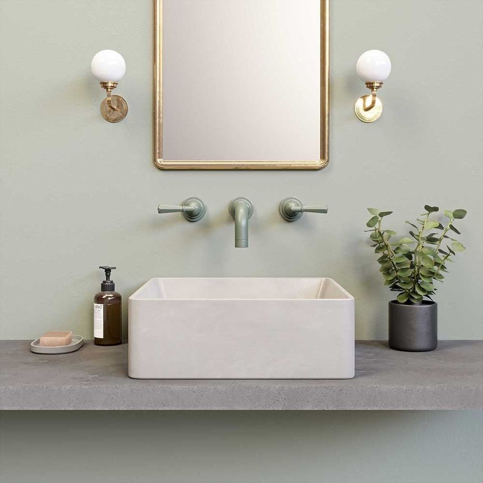 Minimalist Bathroom Sink With Green Fixtures And Gold Mirror Portrayed In A Polished 3D Visualization
