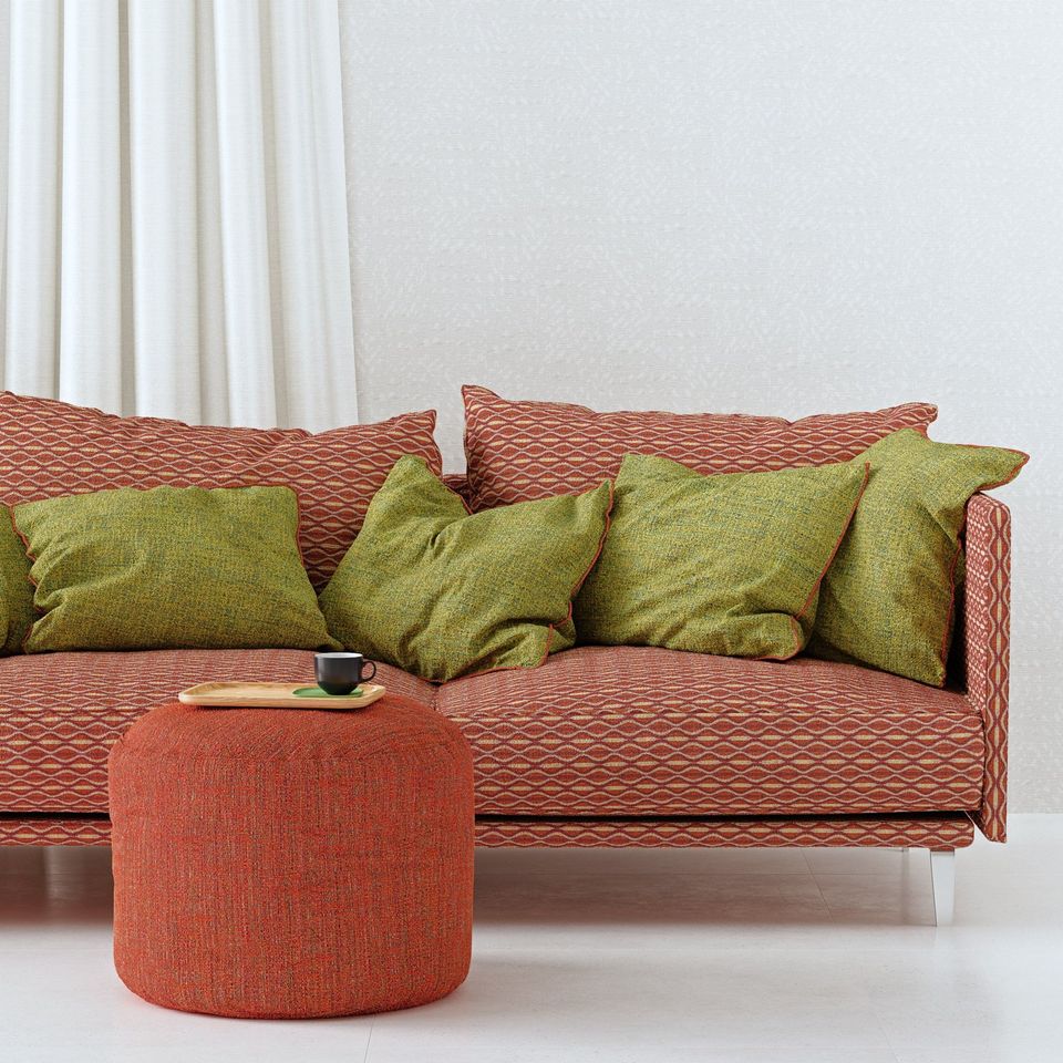 3D Rendering Of A Red Sofa With Green Cushions In A Contemporary Room