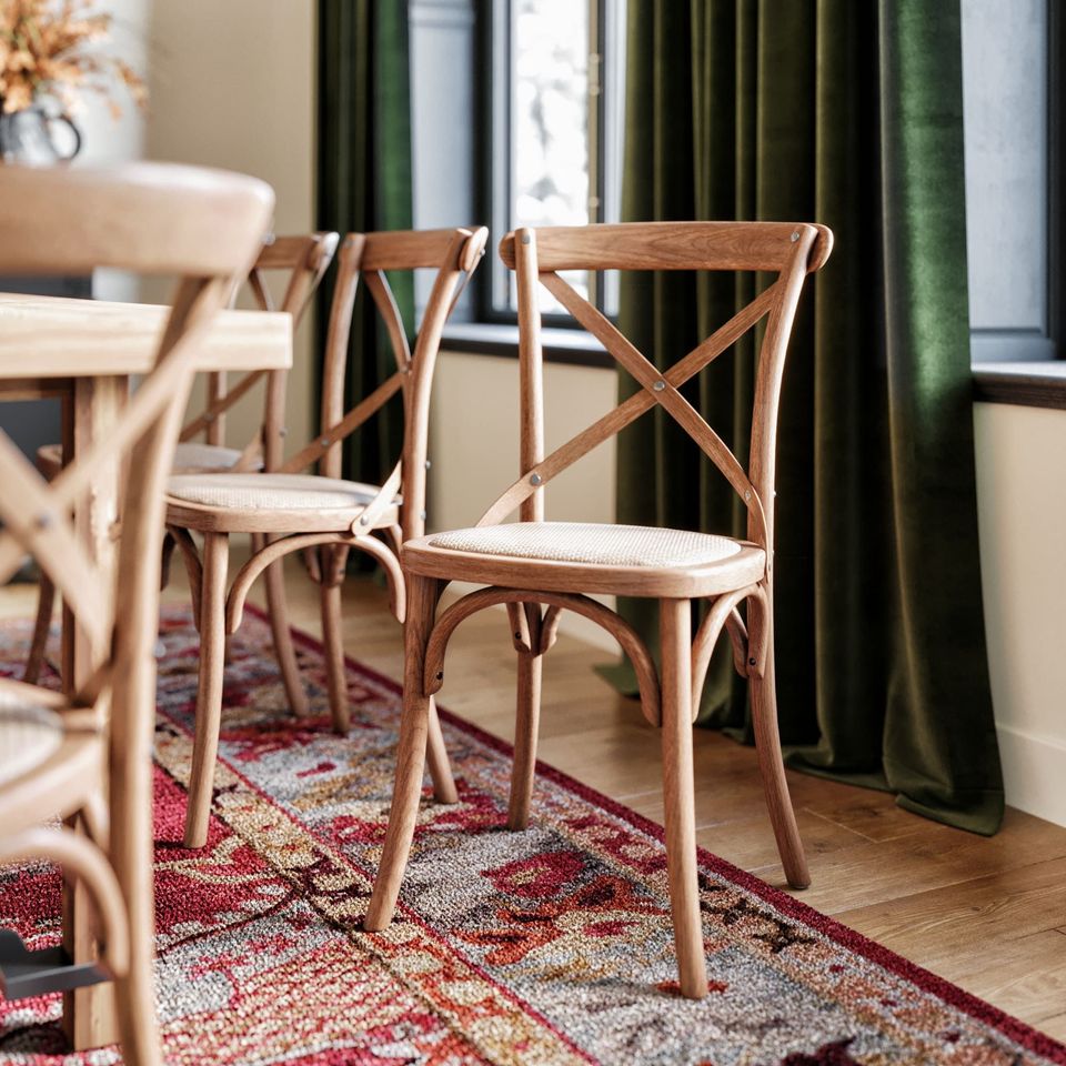 First-class 3D rendering of wooden dining chairs in a cozy interior setting, showcasing photorealistic product visualization.