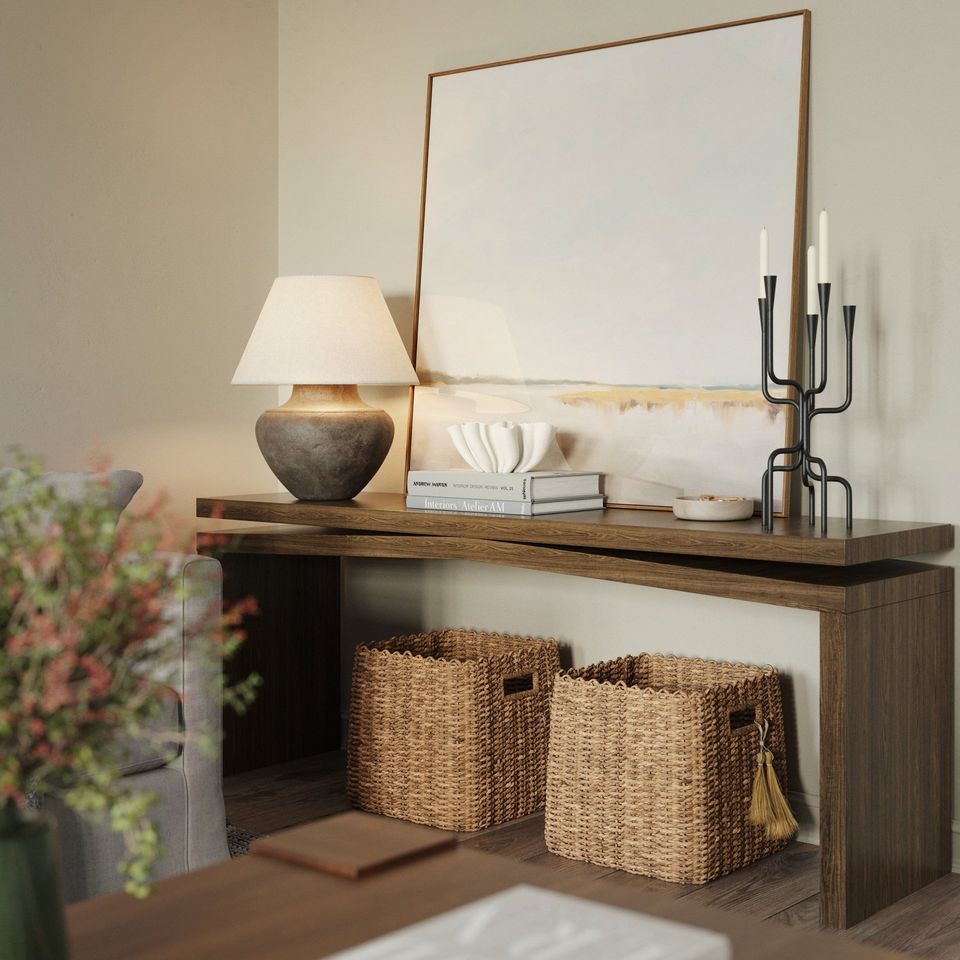 Lifestyle Rendering for Console Table Decorated with Lamp, Artwork and Wicker Baskets