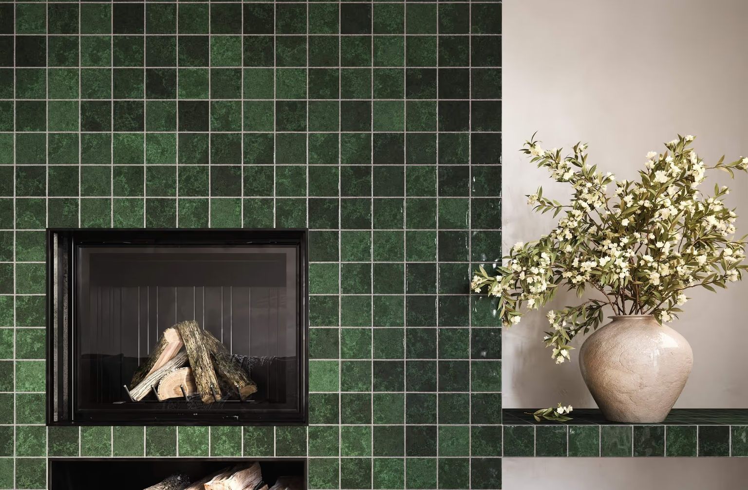 CGI Photography shows a tiled fireplace corner in rich forest green, styled with soft decor accents