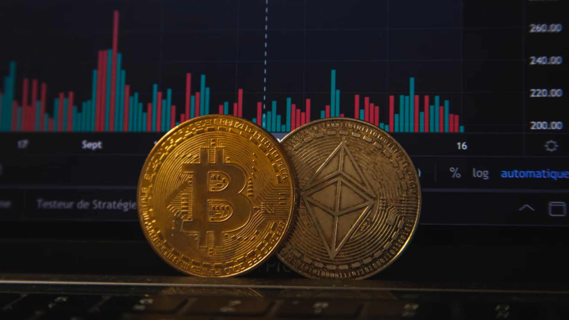 Cryptocurrency coins on a computer keyboard with a stock market graph in the background, symbolizing blockchain’s role in e-commerce trends, ensuring secure and transparent online transactions.