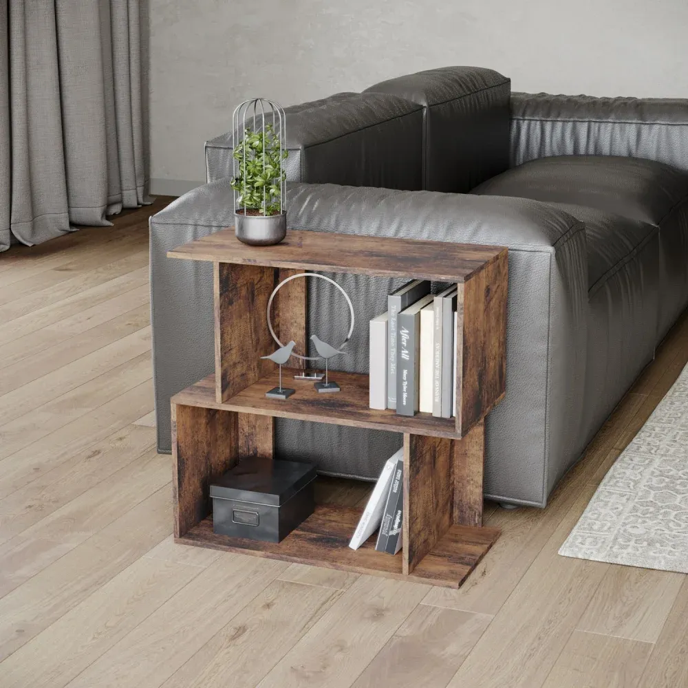 3D visualization services of a wooden side shelf with books, decor, and plant next to a gray sofa