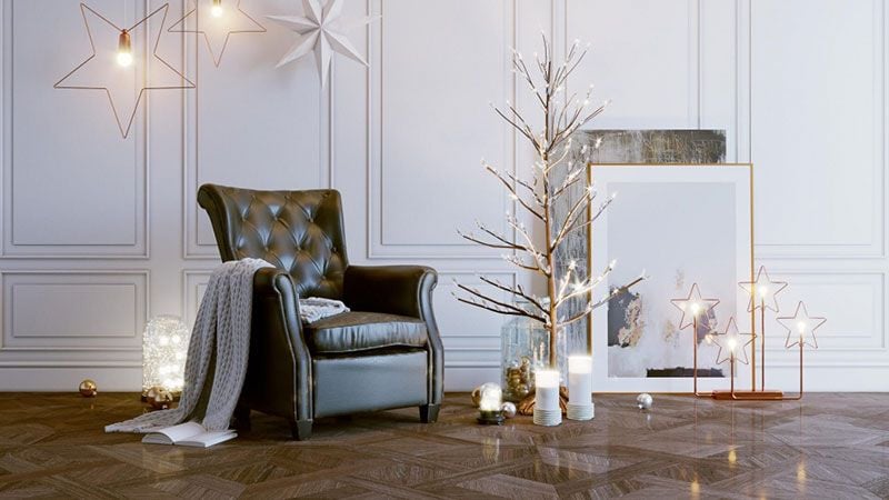 A Festive Brand Collateral Card with a Chair and Decor Items